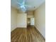 Neutral bedroom featuring hardwood floors, ample natural light, and an ensuite bathroom at 5048 Orchid Springs St, Las Vegas, NV 89148
