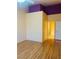 Bright bedroom with hardwood floors and ensuite bathroom at 5048 Orchid Springs St, Las Vegas, NV 89148