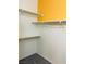 A walk-in closet with white walls, and custom shelving, offering efficient storage solutions at 5048 Orchid Springs St, Las Vegas, NV 89148