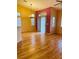 Sunny dining room features hardwood floors, natural lighting, and patio access at 5048 Orchid Springs St, Las Vegas, NV 89148