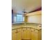 Bright and airy kitchen with granite countertops and stainless steel appliances at 5048 Orchid Springs St, Las Vegas, NV 89148