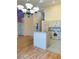 Inviting kitchen area with bar seating and an open concept design at 5048 Orchid Springs St, Las Vegas, NV 89148