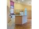 Modern kitchen with stainless appliances, granite countertops, and ample natural light at 5048 Orchid Springs St, Las Vegas, NV 89148
