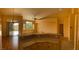 Open floor plan with a breakfast bar, hardwood floors, and light bright rooms at 5048 Orchid Springs St, Las Vegas, NV 89148