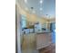Bright kitchen with updated appliances, ample storage, and breakfast bar at 5048 Orchid Springs St, Las Vegas, NV 89148