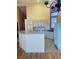 Modern kitchen featuring granite countertops and bright white cabinetry at 5048 Orchid Springs St, Las Vegas, NV 89148