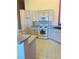 Modern kitchen with stainless steel appliances, granite countertops and updated cabinets at 5048 Orchid Springs St, Las Vegas, NV 89148
