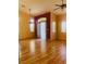 Spacious living room featuring hardwood floors and a stylish ceiling fan at 5048 Orchid Springs St, Las Vegas, NV 89148