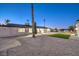 Spacious backyard with artificial turf and gravel at 7910 Firethorn Ln, Las Vegas, NV 89123