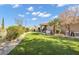 Green backyard with artificial grass, desert landscaping, and plenty of space at 10254 Sofferto Ave, Las Vegas, NV 89135