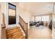 Wooden staircase leading to the second floor and backyard access at 1160 Via Laterna, Henderson, NV 89052