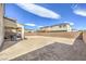 Spacious backyard with covered patio and grassy area at 1934 Karner Blue Ave, North Las Vegas, NV 89031