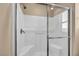 Clean shower with tiled walls and glass enclosure at 2134 William Holden Ct, Las Vegas, NV 89142