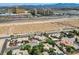 Property overview showing house, landscaping, and surrounding area at 3245 W Landberg Ave, Las Vegas, NV 89141