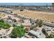 Aerial view of a house with a pool and large backyard near a highway at 3245 W Landberg Ave, Las Vegas, NV 89141