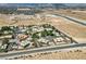 Aerial view of a house with a pool and large backyard in a desert setting at 3245 W Landberg Ave, Las Vegas, NV 89141