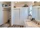 Bathroom with a shower, vanity, and linen closet at 3245 W Landberg Ave, Las Vegas, NV 89141