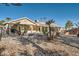 Single story home with a large backyard and mature landscaping at 3245 W Landberg Ave, Las Vegas, NV 89141