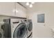 Bright laundry room with LG washer and dryer, and ample storage at 3245 W Landberg Ave, Las Vegas, NV 89141