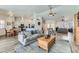 Bright and airy living room with hardwood floors and a cozy seating area at 3245 W Landberg Ave, Las Vegas, NV 89141