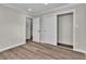 Well-lit bedroom with wood-look floors and built-in closet at 3637 Maria St, Las Vegas, NV 89121