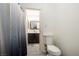 Clean bathroom with toilet, shower, and vanity at 4045 Village Sq, Las Vegas, NV 89121