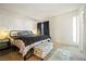 Spacious bedroom with king-size bed and plush carpet at 4045 Village Sq, Las Vegas, NV 89121