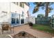 Small patio with seating and fire pit at 4045 Village Sq, Las Vegas, NV 89121