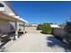 Spacious backyard with covered patio and ample space for outdoor activities at 5402 Night Swim Ln, Las Vegas, NV 89113