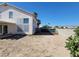 Large backyard with block wall and desert landscaping at 5402 Night Swim Ln, Las Vegas, NV 89113