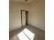 Small bedroom with a closet and window at 5402 Night Swim Ln, Las Vegas, NV 89113