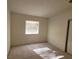 Simple bedroom with window and closet at 5402 Night Swim Ln, Las Vegas, NV 89113