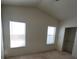 Bright bedroom with two windows and a large closet at 5402 Night Swim Ln, Las Vegas, NV 89113