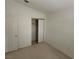Bright bedroom with closet and door at 5402 Night Swim Ln, Las Vegas, NV 89113
