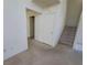 Clean hallway with access to bedrooms and stairs at 5402 Night Swim Ln, Las Vegas, NV 89113