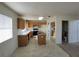 Bright kitchen with island and ample cabinetry at 5402 Night Swim Ln, Las Vegas, NV 89113