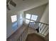 View of living room from upstairs showing high ceilings and ample light at 5402 Night Swim Ln, Las Vegas, NV 89113