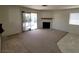Living room with fireplace and sliding glass door at 5402 Night Swim Ln, Las Vegas, NV 89113