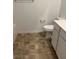 Bathroom with toilet, vanity, and bathtub at 7368 N Decatur Blvd # 1, Las Vegas, NV 89131