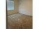 Carpeted bedroom with window and blinds at 7368 N Decatur Blvd # 1, Las Vegas, NV 89131