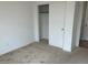 Bright bedroom with carpeted floors and spacious closet at 7368 N Decatur Blvd # 1, Las Vegas, NV 89131