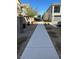 Landscaped community pathway with homes on either side at 7368 N Decatur Blvd # 1, Las Vegas, NV 89131