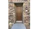 Inviting front door entrance with stone exterior at 7368 N Decatur Blvd # 1, Las Vegas, NV 89131