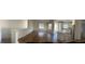 Open concept living and kitchen area with hardwood floors at 7368 N Decatur Blvd # 1, Las Vegas, NV 89131