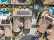 Aerial view of house, yard, and pool with solar panels on the roof at 8229 Flowing Rapids Ct, Las Vegas, NV 89131
