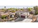 Single-story home with a large backyard and solar panels at 8229 Flowing Rapids Ct, Las Vegas, NV 89131