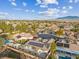 Aerial view showcasing home, pool, and surrounding neighborhood at 8229 Flowing Rapids Ct, Las Vegas, NV 89131