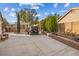 Backyard with pergola, patio, and a Jeep parked at 8229 Flowing Rapids Ct, Las Vegas, NV 89131