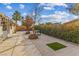 Backyard patio with landscaping and a seating area at 8229 Flowing Rapids Ct, Las Vegas, NV 89131