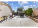 Large backyard with pergola, spacious patio, and mature trees at 8229 Flowing Rapids Ct, Las Vegas, NV 89131